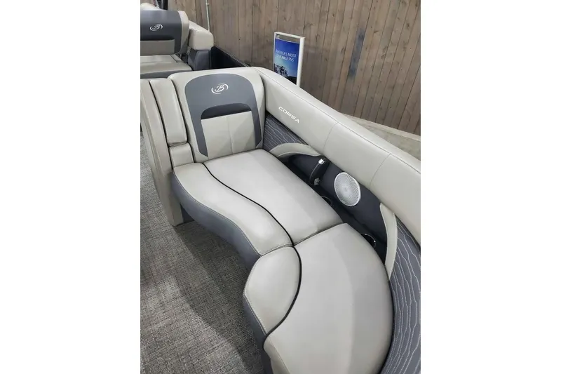 Slide: The Image of 2024 Barletta Corsa 23UA boat interior with luxurious seating and modern design. - 7