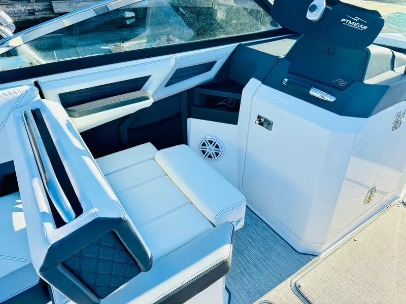 Slide: The Image of Interior of 2023 Cobalt R8 boat, featuring modern seating and dashboard design. - 7