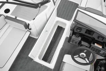 Slide: The Image of 2026 Yamaha Boats AR190 interior with steering wheel and seating area. - 11