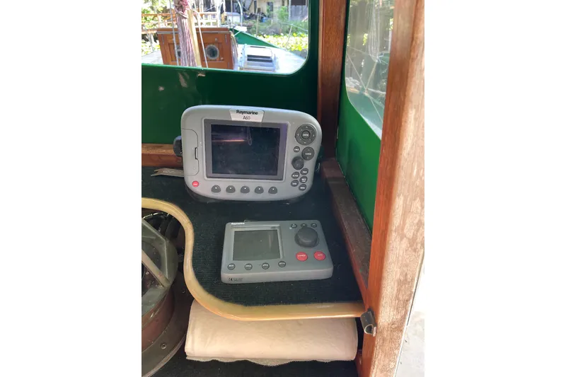 Slide: The Image of Marine navigation equipment inside a 1995 Rover Marine Lines Bonny Rover boat. - 14