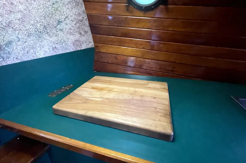 Slide: The Image of Wooden cutting board on green countertop in 1995 Rover Marine Lines Bonny Rover. - 23