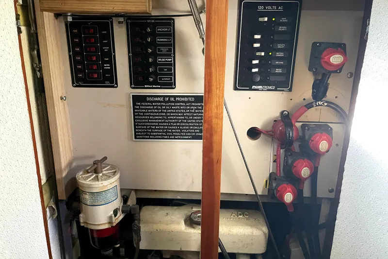 Slide: The Image of Electrical panel and controls inside a 1995 Rover Marine Lines Bonny Rover boat. - 51