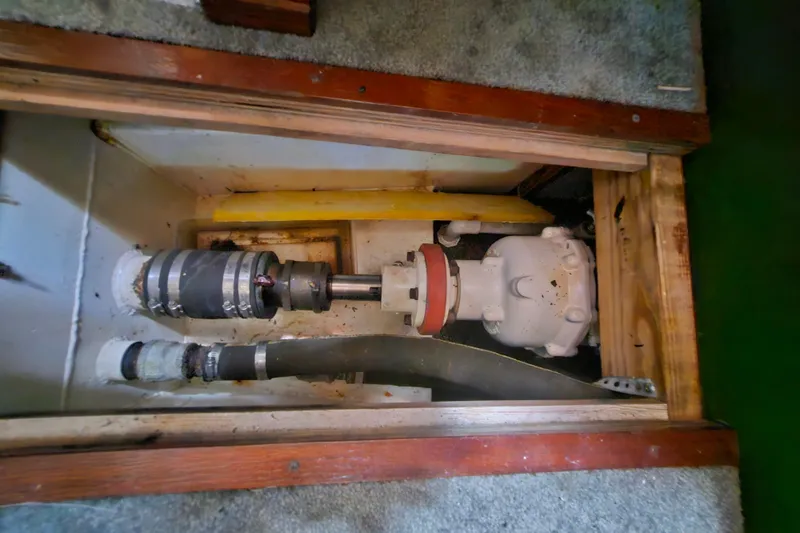 Slide: The Image of Engine compartment of a 1995 Rover Marine Lines Bonny Rover boat. - 55