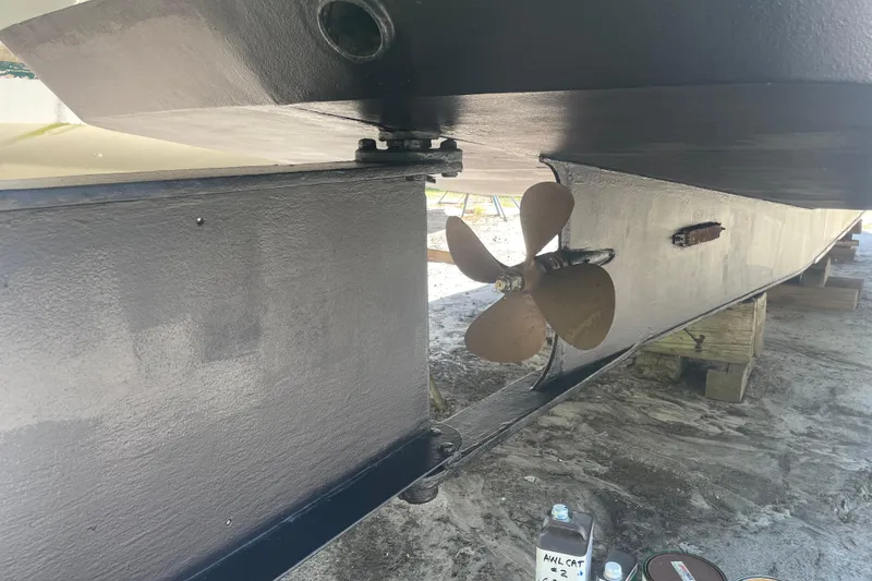 Slide: The Image of Propeller and hull of 1995 Rover Marine Lines Bonny Rover boat on dry dock. - 9