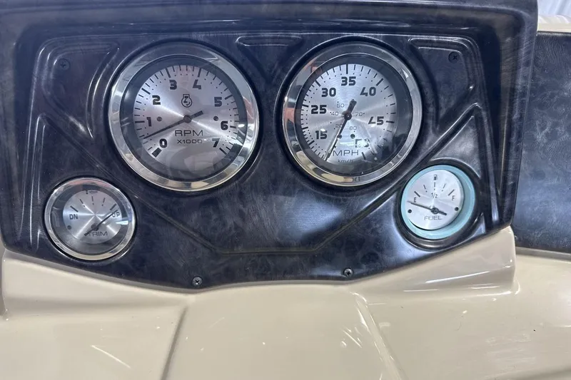 Slide: The Image of Dashboard of 2021 SunCatcher Select 20C boat with RPM, speed, and fuel gauges. - 15