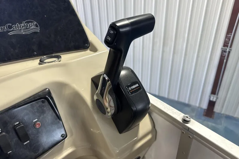 Slide: The Image of Control panel of 2021 SunCatcher Select 20C boat with Yamaha throttle lever. - 16