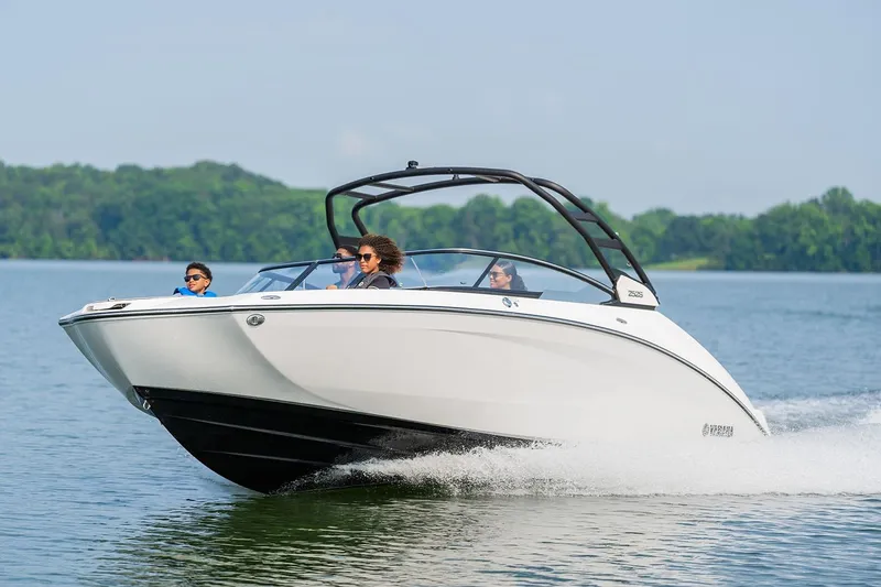 Slide: The Image of Manufacturer Provided Image: 2026 Yamaha Boats 252S cruising on a lake with passengers enjoying the ride. - 1
