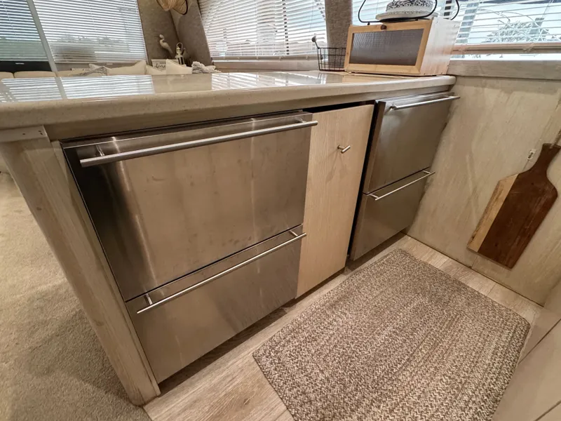Slide: The Image of 1995 Ocean Yachts 42 SS kitchen area with modern drawers. - 23