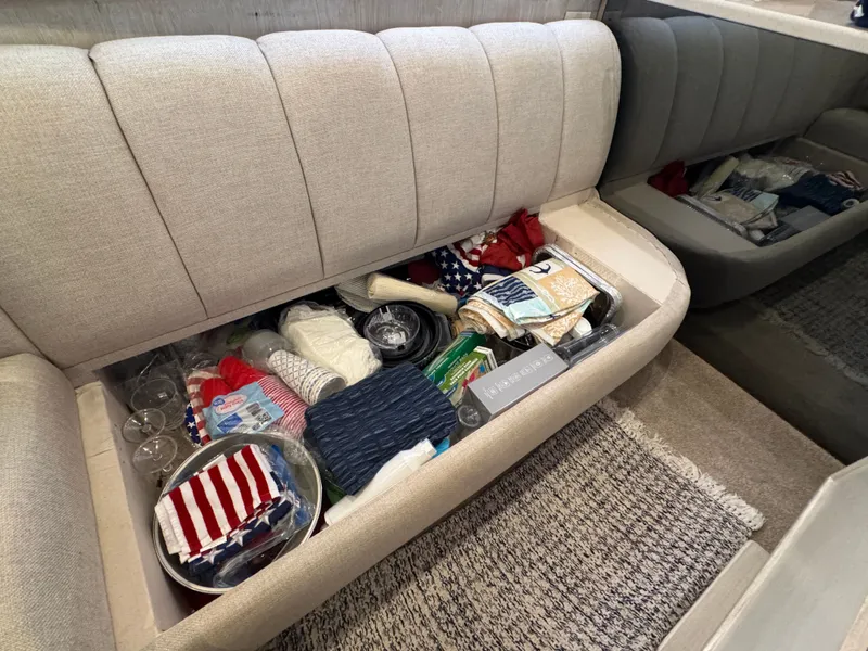 Slide: The Image of Interior of Ocean Yachts 42 SS with storage under the seat. - 29