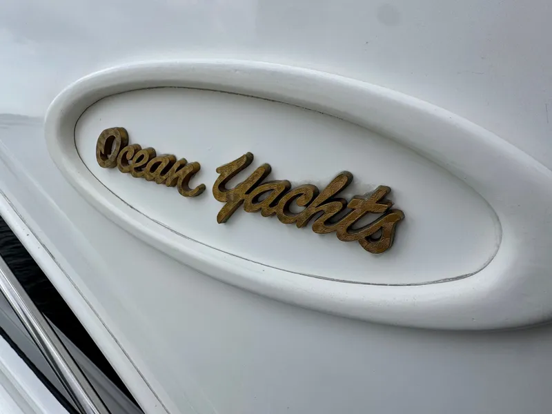 Slide: The Image of Ocean Yachts 42 SS 1995 emblem on white background. - 3