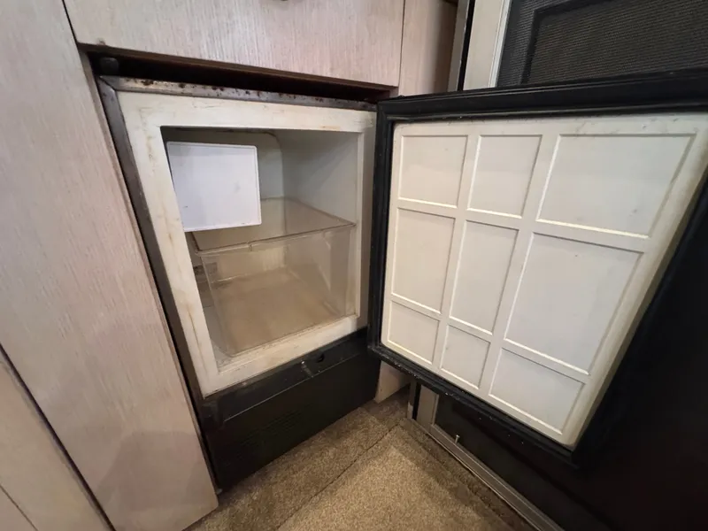 Slide: The Image of Open refrigerator on Ocean Yachts 42 SS, year 1995. - 33