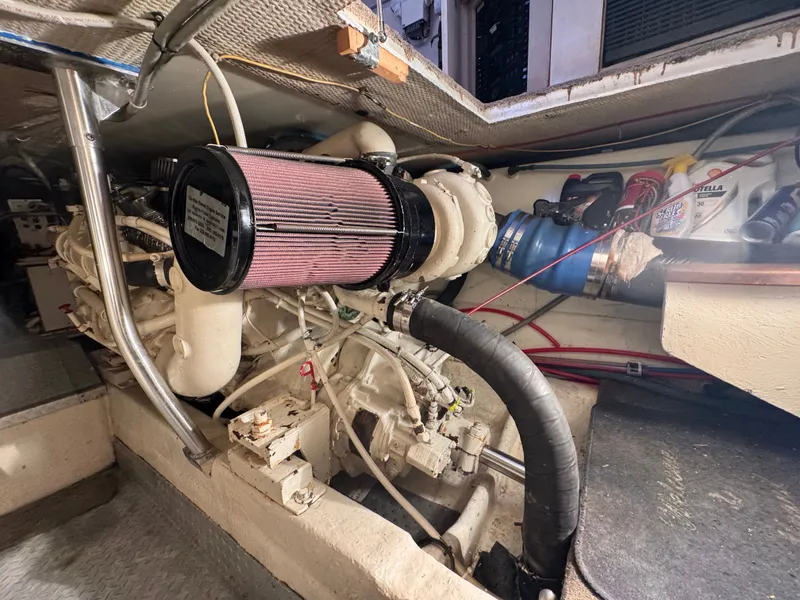 Slide: The Image of Engine room of a 1995 Ocean Yachts 42 SS with visible engine. - 35