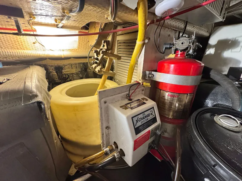 Slide: The Image of Engine room of 1995 Ocean Yachts 42 SS with fire extinguisher. - 38