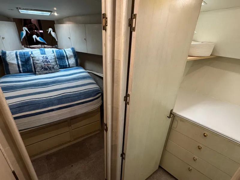Slide: The Image of Interior of 1995 Ocean Yachts 42 SS featuring cozy bedroom. - 45