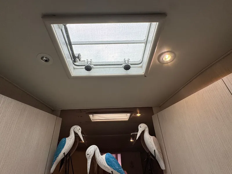 Slide: The Image of Interior view of a 1995 Ocean Yachts 42 SS with skylight. - 49