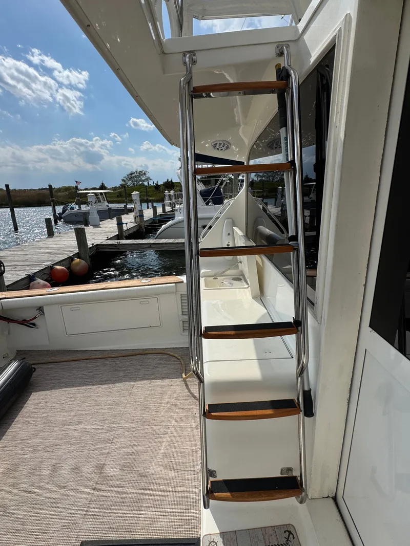 Slide: The Image of Ladder on a 1995 Ocean Yachts 42 SS at the dock. - 8