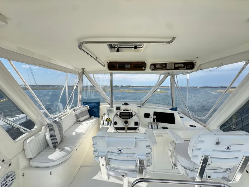 Slide: The Image of Interior of a 1995 Ocean Yachts 42 SS yacht with helm station. - 9