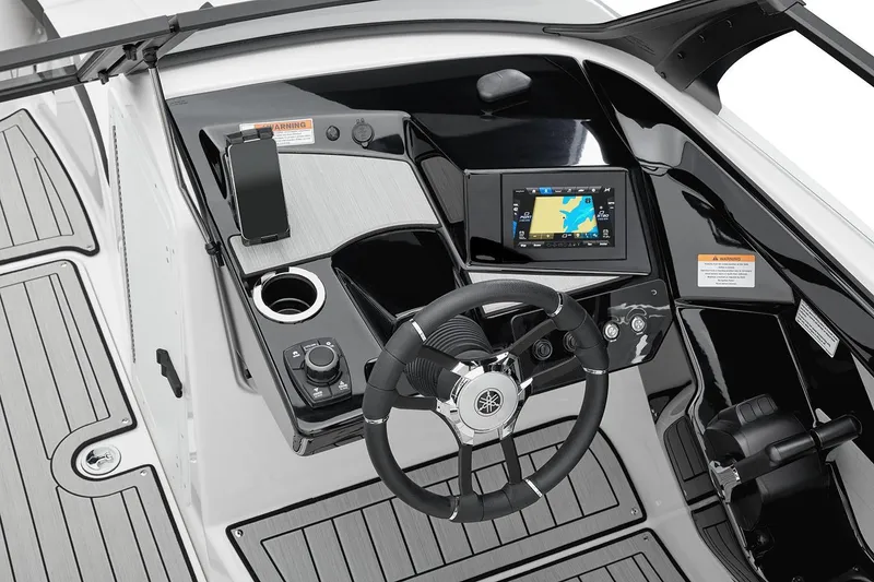 Slide: The Image of Manufacturer Provided Image: 2026 Yamaha Boats 222S dashboard with steering wheel, touchscreen display, and control panel. - 8