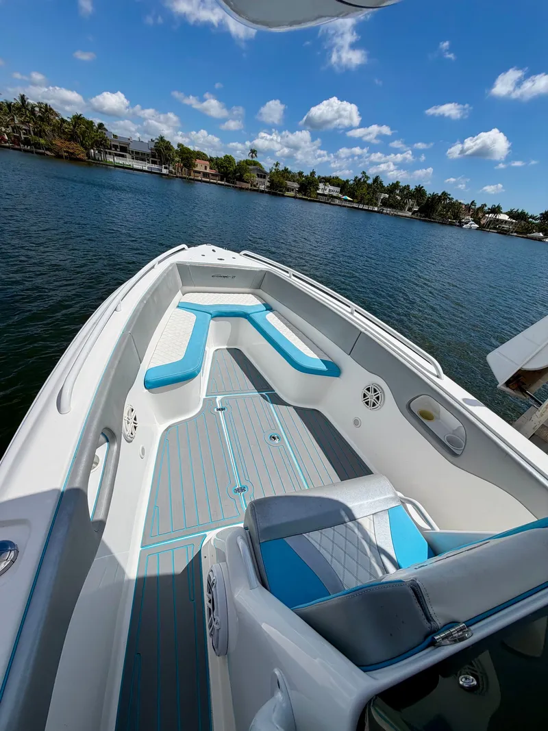 Slide: The Image of 2019 Concept 27 boat on calm water with blue sky. - 6