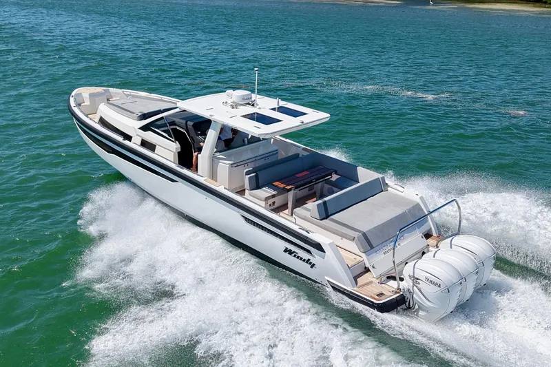 The Image of 2022 Windy SR 44 BLACKHAWK cruising on open water, showcasing sleek design and powerful engines. - 0