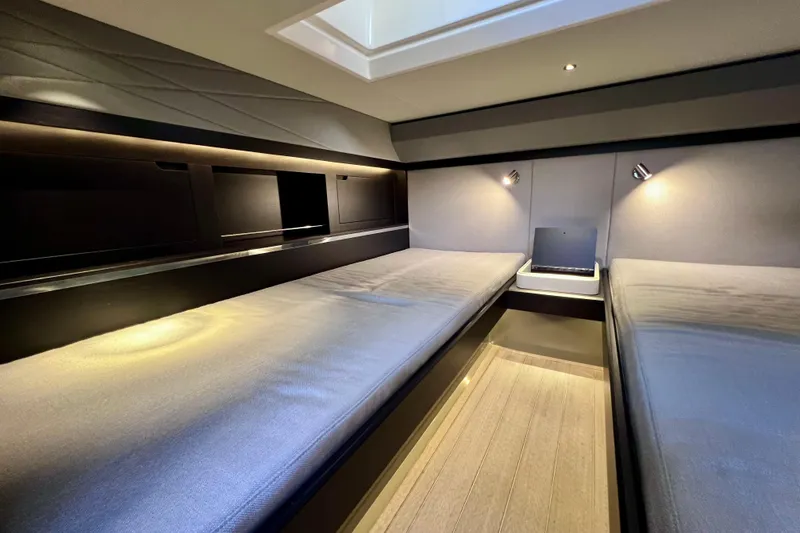 Slide: The Image of Luxurious interior cabin of 2022 Windy SR 44 BLACKHAWK yacht with modern lighting. - 104