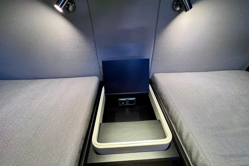 Slide: The Image of Interior of 2022 Windy SR 44 BLACKHAWK, featuring sleek seating and modern lighting. - 105