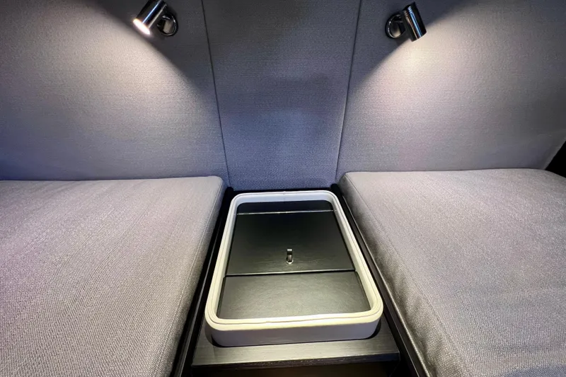 Slide: The Image of Interior of 2022 Windy SR 44 BLACKHAWK yacht with modern seating and ambient lighting. - 106