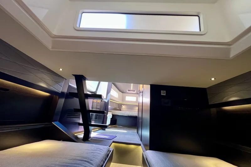 Slide: The Image of Luxurious interior of 2022 Windy SR 44 BLACKHAWK yacht, featuring modern design and ambient lighting. - 107