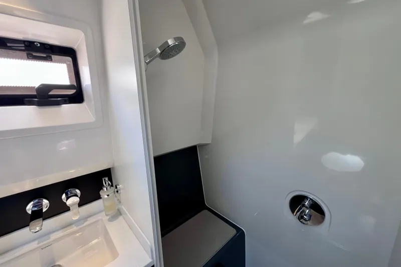 Slide: The Image of Modern bathroom interior on 2022 Windy SR 44 BLACKHAWK yacht, featuring sleek fixtures and shower. - 109