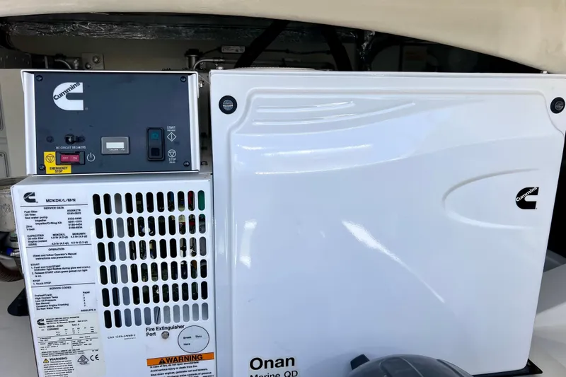 Slide: The Image of Cummins Onan Marine QD generator in a 2022 Windy SR 44 BLACKHAWK yacht. - 120