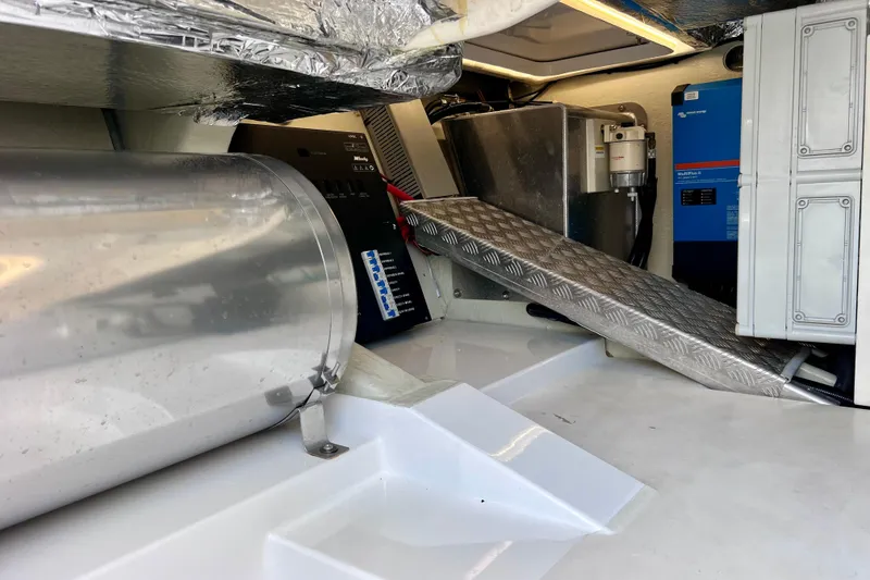 Slide: The Image of Engine room of 2022 Windy SR 44 BLACKHAWK with equipment and metallic components. - 121