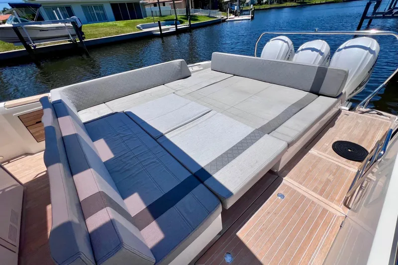 Slide: The Image of Luxurious seating area on 2022 Windy SR 44 BLACKHAWK yacht by the water. - 27