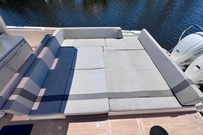 Slide: The Image of Luxurious seating area on 2022 Windy SR 44 BLACKHAWK yacht, overlooking water. - 28