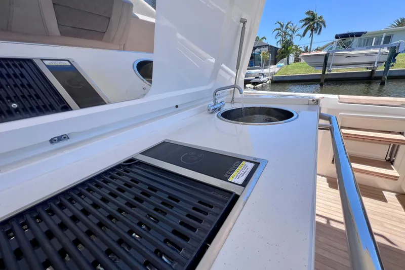 Slide: The Image of Outdoor kitchen on 2022 Windy SR 44 BLACKHAWK yacht with sink and grill. - 39