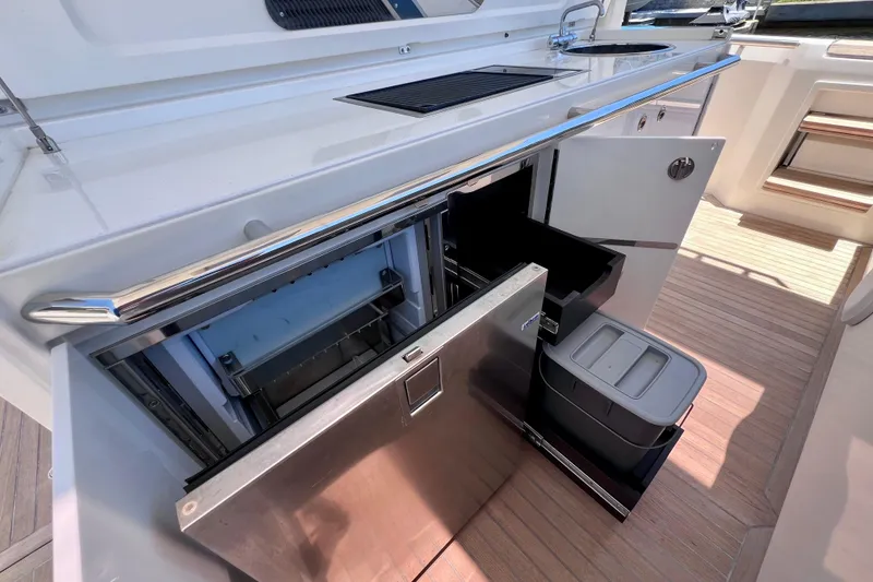 Slide: The Image of Luxury yacht kitchen with open fridge and storage, Windy SR 44 BLACKHAWK 2022 model. - 41