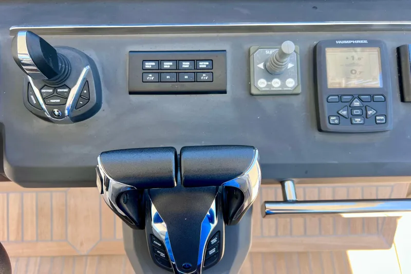 Slide: The Image of Control panel of 2022 Windy SR 44 BLACKHAWK boat with joystick and display. - 48