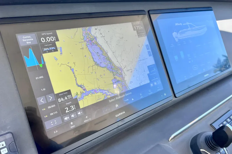 Slide: The Image of Navigation display on 2022 Windy SR 44 BLACKHAWK showing map and data. - 53