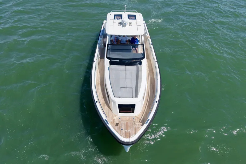 Slide: The Image of 2022 Windy SR 44 BLACKHAWK luxury yacht cruising on open water. - 6