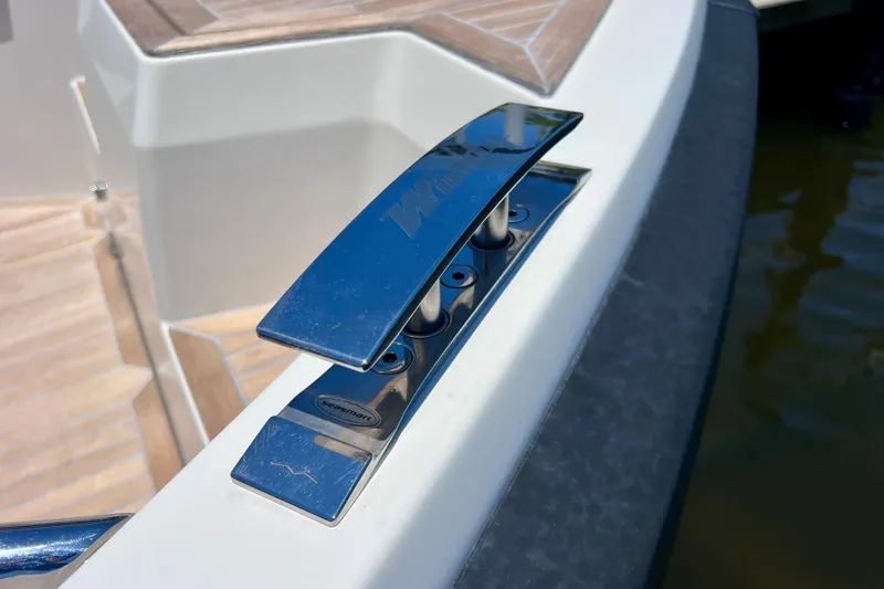 Slide: The Image of Close-up of a 2022 Windy SR 44 BLACKHAWK boat cleat, showcasing sleek design. - 77