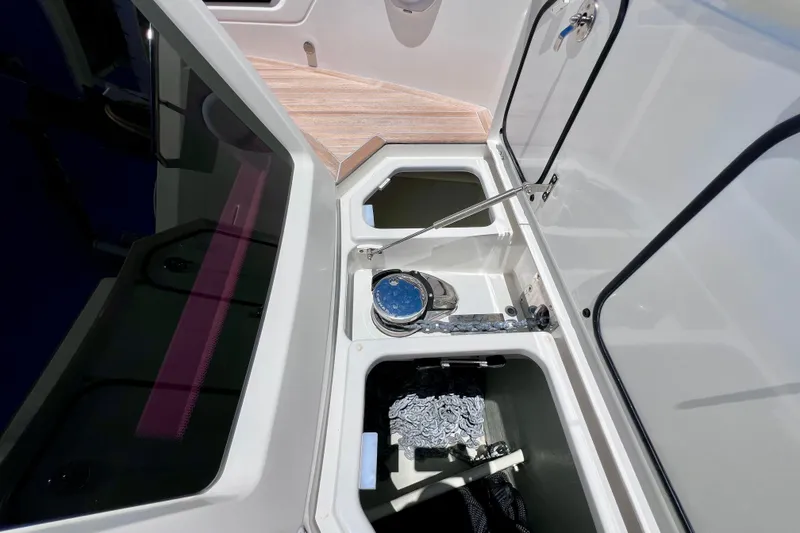 Slide: The Image of Storage compartments on a 2022 Windy SR 44 BLACKHAWK boat, showcasing sleek design and functionality. - 83