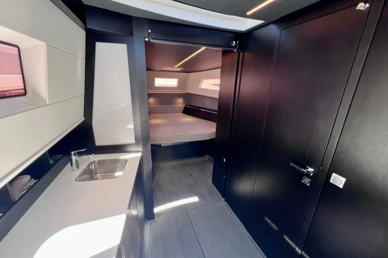 Slide: The Image of Luxurious interior of 2022 Windy SR 44 BLACKHAWK yacht with modern design and cozy cabin. - 85