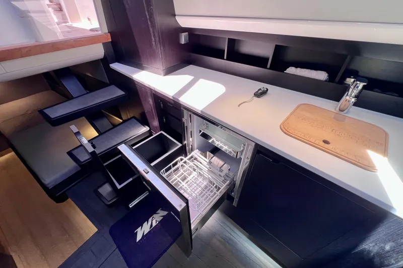 Slide: The Image of Luxurious interior of 2022 Windy SR 44 BLACKHAWK yacht with modern kitchen amenities. - 87