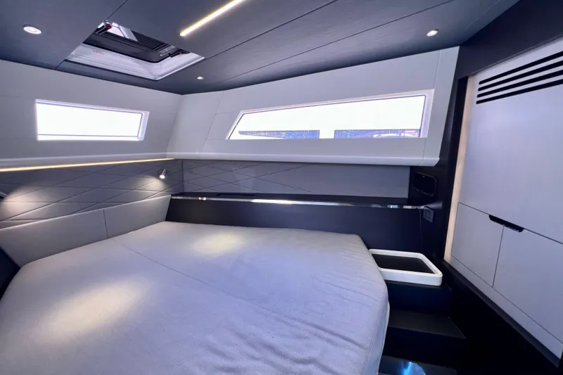 Slide: The Image of Luxurious interior cabin of 2022 Windy SR 44 BLACKHAWK yacht, featuring modern design and ambient lighting. - 93