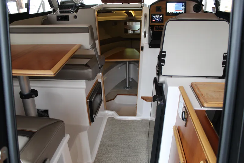 Slide: The Image of Interior of 2024 Cutwater C-248 Coupe, featuring modern design and comfortable seating. - 13