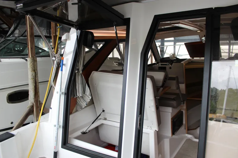 Slide: The Image of 2024 Cutwater C-248 Coupe interior view, showcasing seating and cabin details. - 17