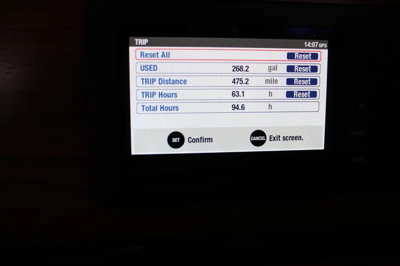 Slide: The Image of Dashboard display of 2024 Cutwater C-248 Coupe showing trip data and reset options. - 21