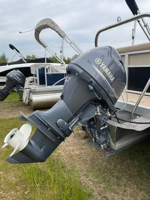 Slide: The Image of 2013 Bennington 20SLMX pontoon boat with Yamaha outboard motor. - 6