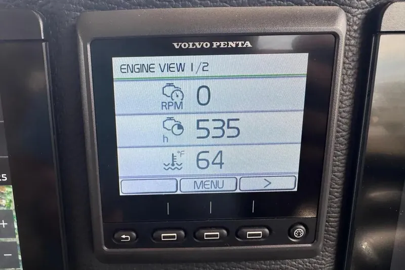Slide: The Image of Volvo Penta engine display on 2020 Cutwater C-30 CB, showing RPM, hours, and temperature. - 14