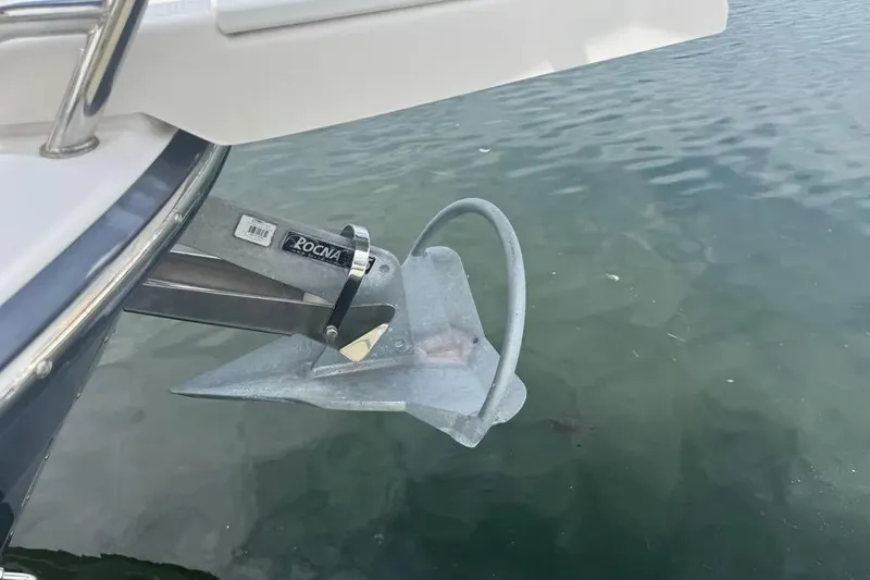 Slide: The Image of Anchor of 2020 Cutwater C-30 CB boat in water, featuring Rocna brand. - 6
