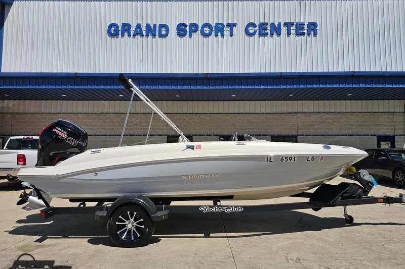 Slide: The Image of 2023 Stingray 182 SC boat on trailer at Grand Sport Center. - 3